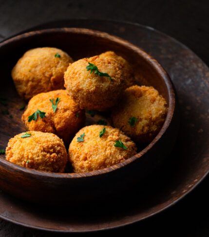 bowl of saffron and pumpkin risotto balls